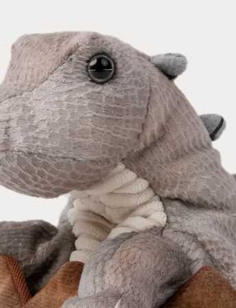 Handpuppe Stegosaurus in einem Ei